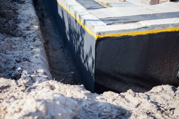 Professional Basement Waterproofing technician working in Conshohocken, PA